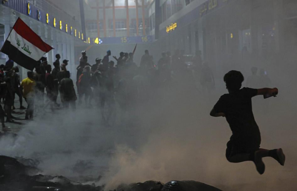 Protesters take part in an anti-government demonstration outside the provincial council building in Basra, Iraq, August 17, 2020. 