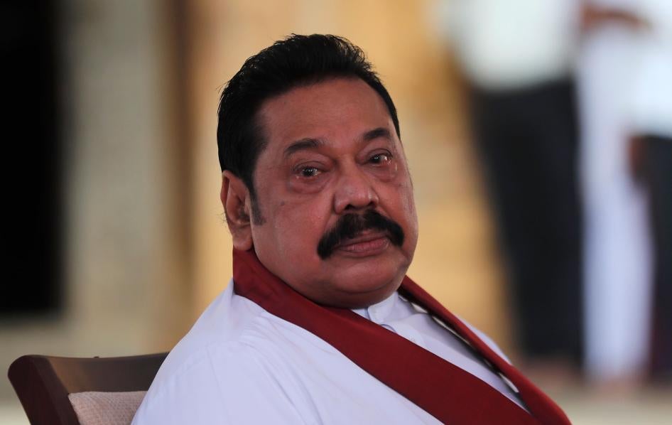 Sri Lanka’s former President Mahinda Rajapaksa, waits to be sworn in as prime minister at Kelaniya Royal Buddhist temple in Colombo, Sri Lanka, August 9, 2020.