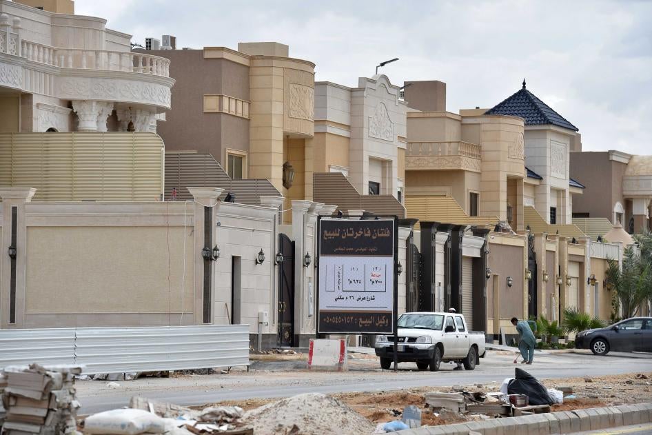 Foreign laborers work on the construction of new luxury houses in the Saudi capital, Riyadh, April 2019.