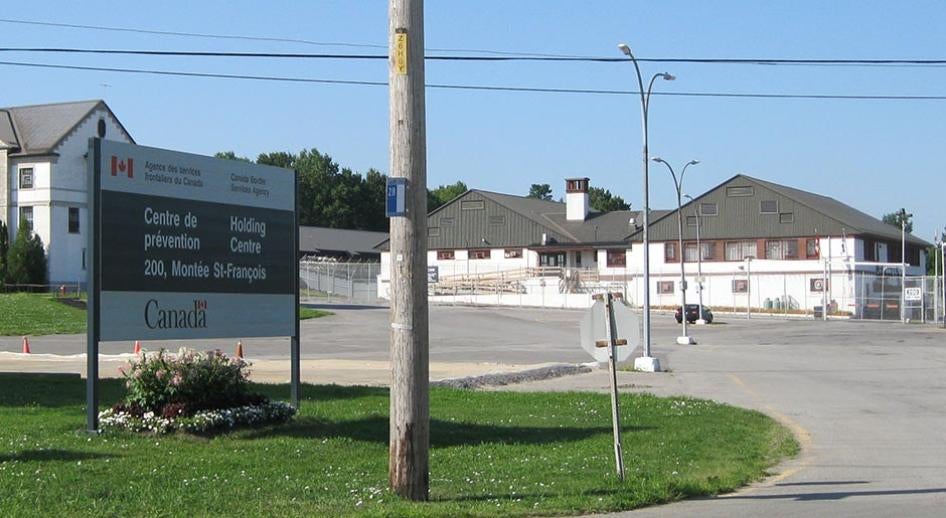 Entrance to the Canadian Border Security Agency's (CBSA) Laval Immigration Holding Centre in Quebec, Canada, showing a the entrance sign with the Canadian flag and the detention center in the background..