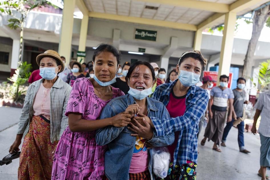 Women cry after seeing the body of their relative killed on March 14th by security forces during a peaceful protest in Yangon, Myanmar.