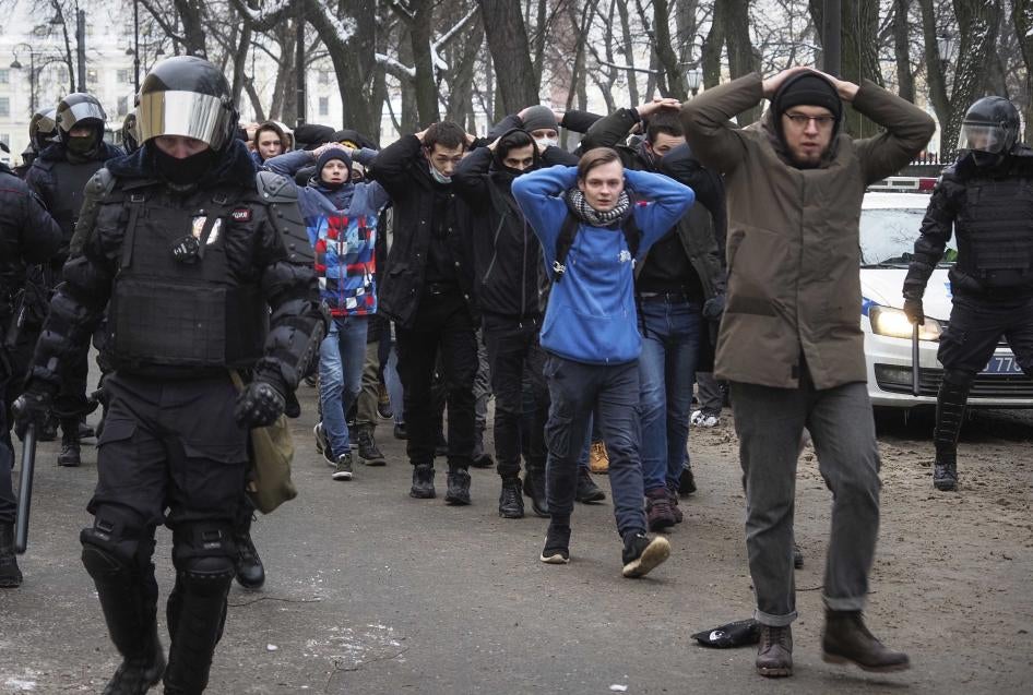 Police detain protesters at a rally against the jailing of opposition leader Alexei Navalny in St. Petersburg, January 31, 2021.