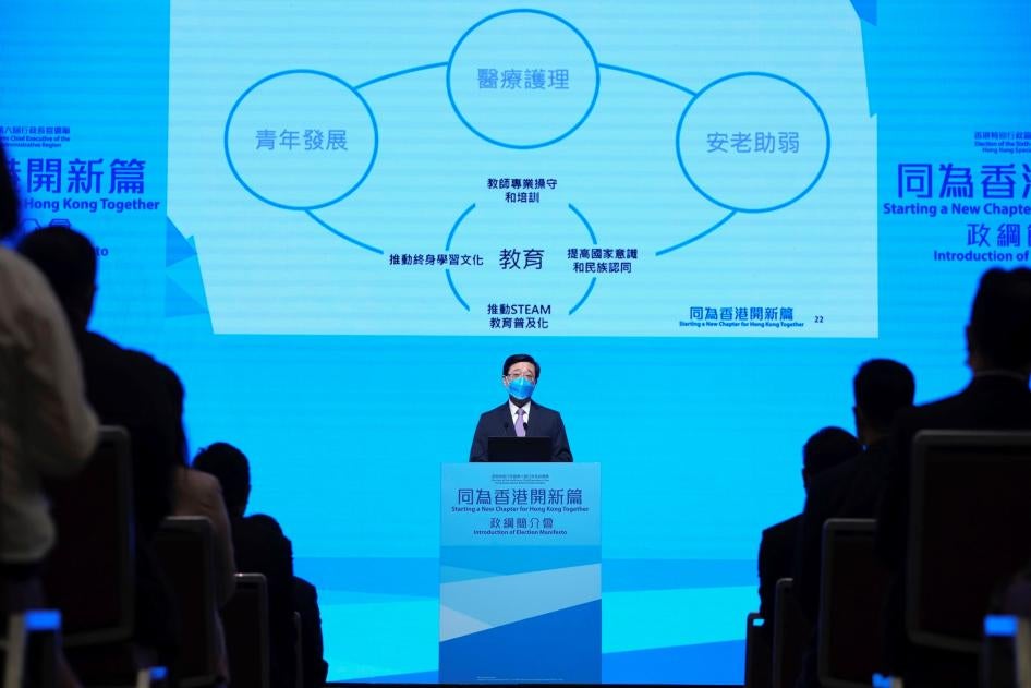 John Lee announces his manifesto during the 2022 chief executive electoral campaign in Hong Kong.