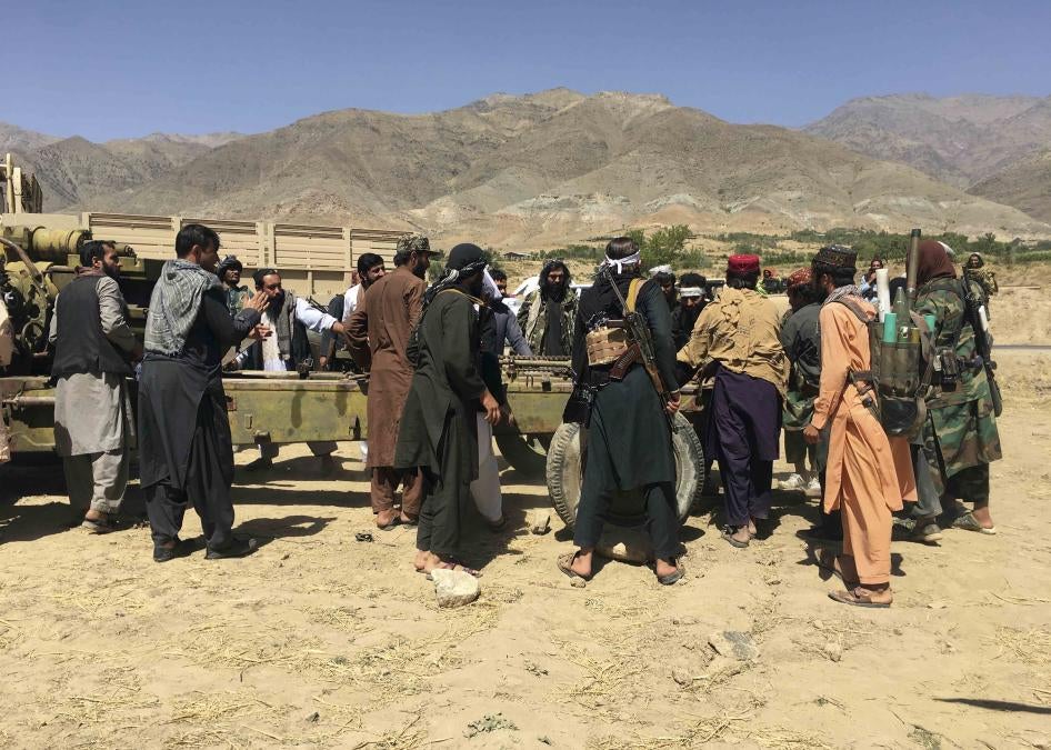 Taliban soldiers gather with weapons and machinery in Panjshir province, northern Afghanistan, September 8, 2021.