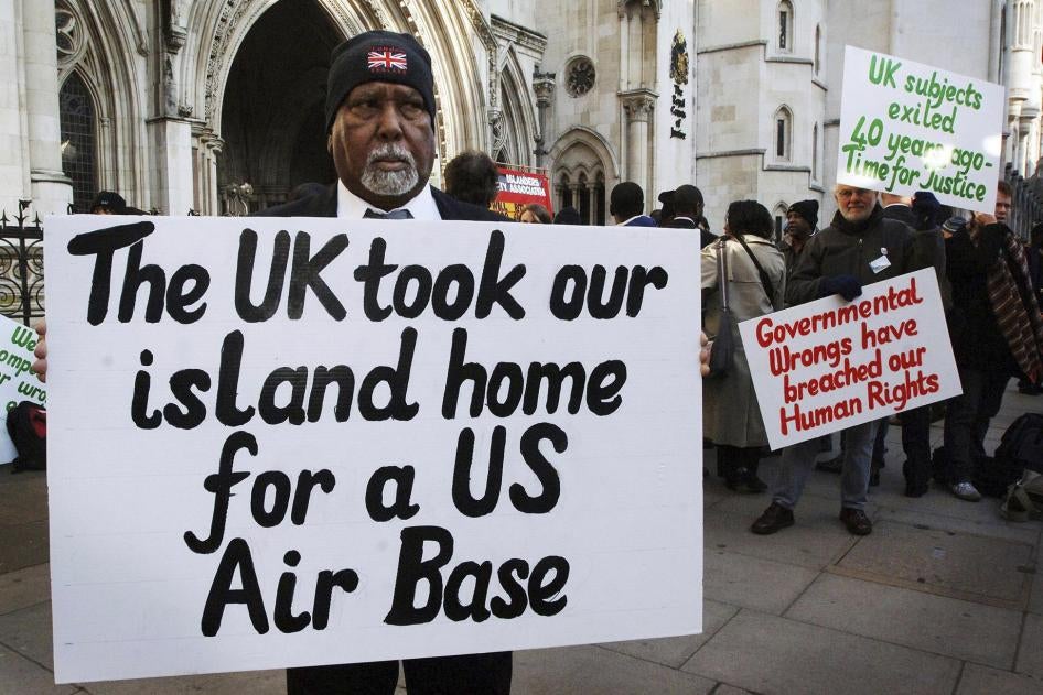 Rosemond Sameenaden joins other Chagos islanders outside the High Court, London, where they are fighting the UK government for the reinstatement of their homeland. 