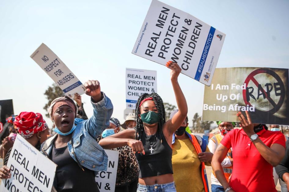 Community members protest against gender-based violence in Vlakfontein, South Africa, August 25, 2021. 
