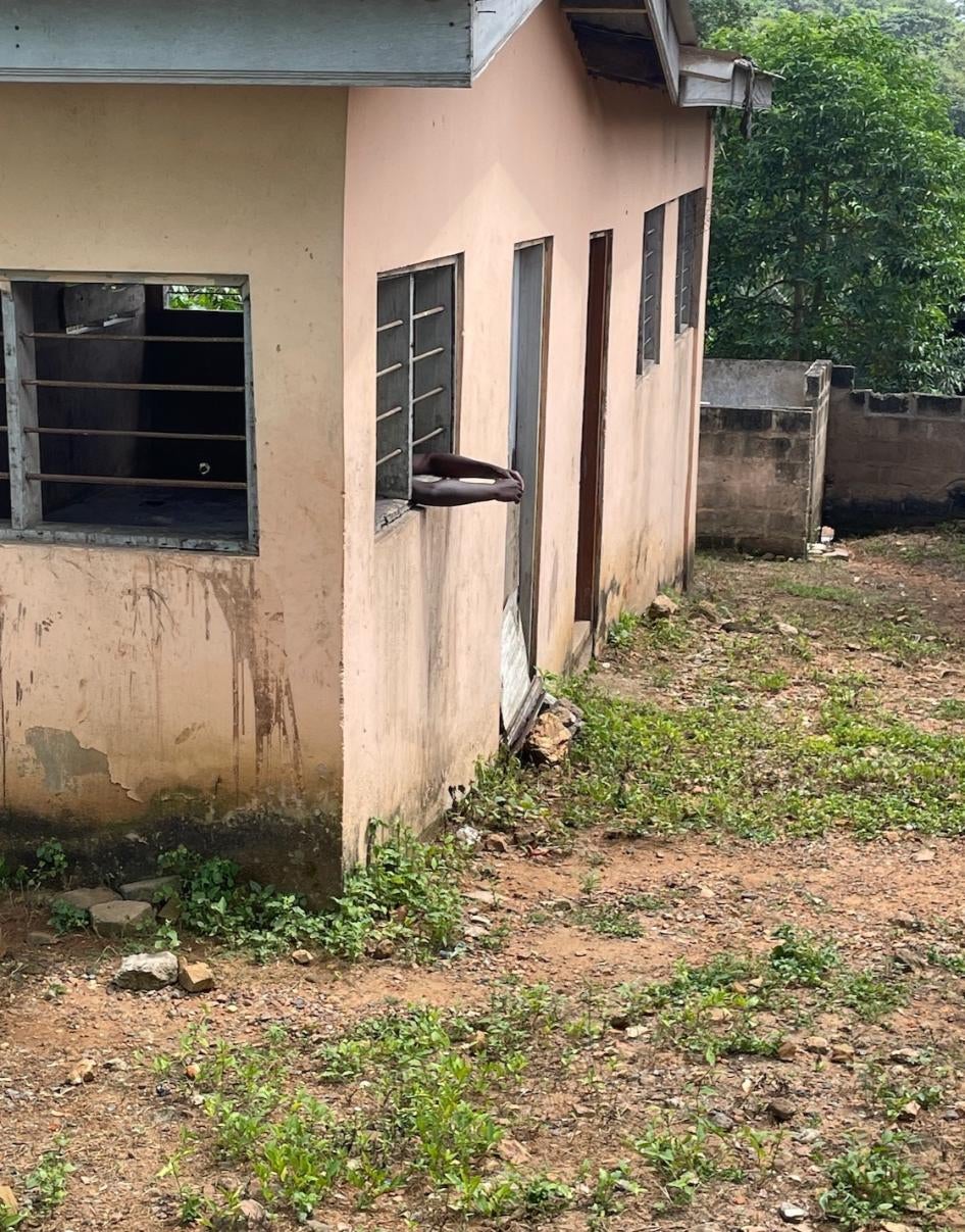 Pamela (not her real name), a woman with a real or perceived mental health condition, confined in a room at a prayer camp in Eastern region, Ghana, November 2022. 