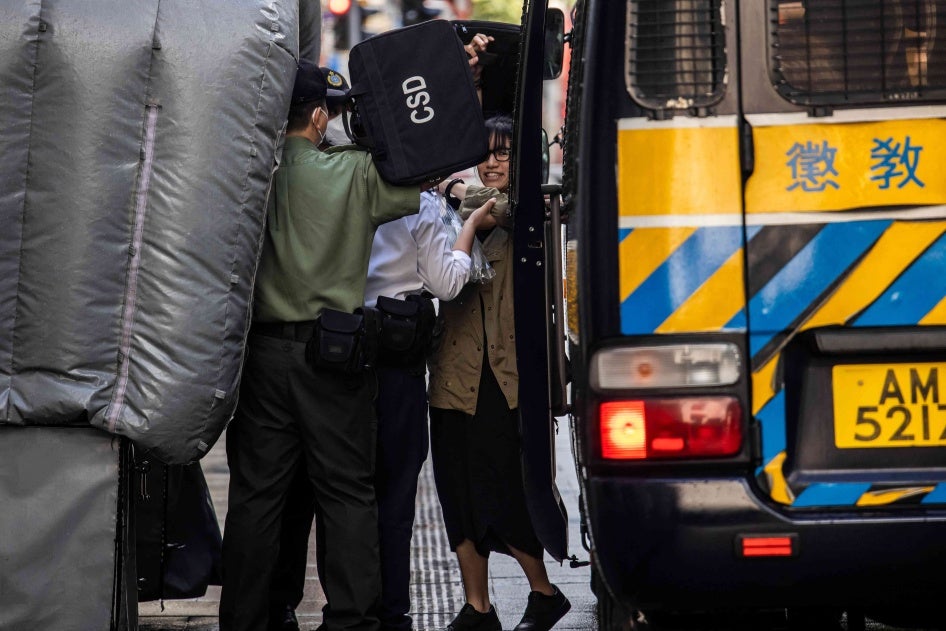 Chow Hang-tung (R) arrives at the Court of Final Appeal in Hong Kong on June 8, 2023.