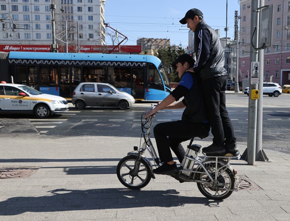 Two work migrants from Central Asia in Moscow, Russia, April 14, 2023.