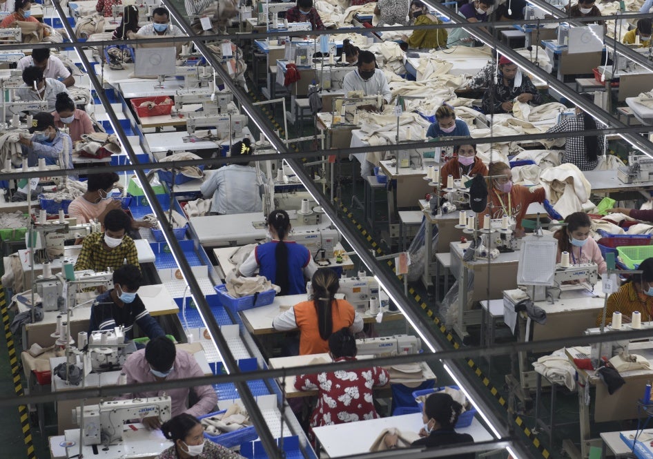 Garment workers at a factory in Phnom Penh, Cambodia, December 17, 2021.