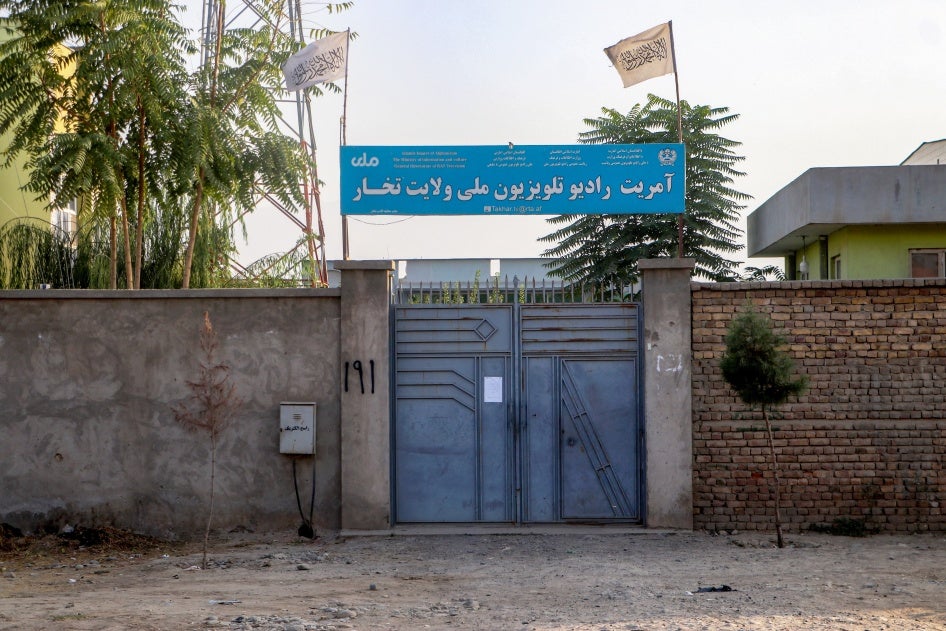The Taliban flag flies over a National Radio Television of Takhar (RTA) building in Talogan, Afghanistan, on October 15, 2024.