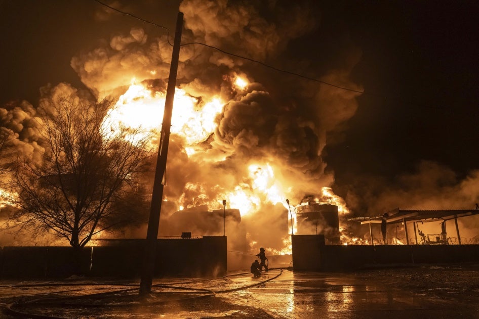 Firefighters extinguish a fire after a Russian attack on a neighborhood in Kharkiv, Ukraine, February 10, 2024.