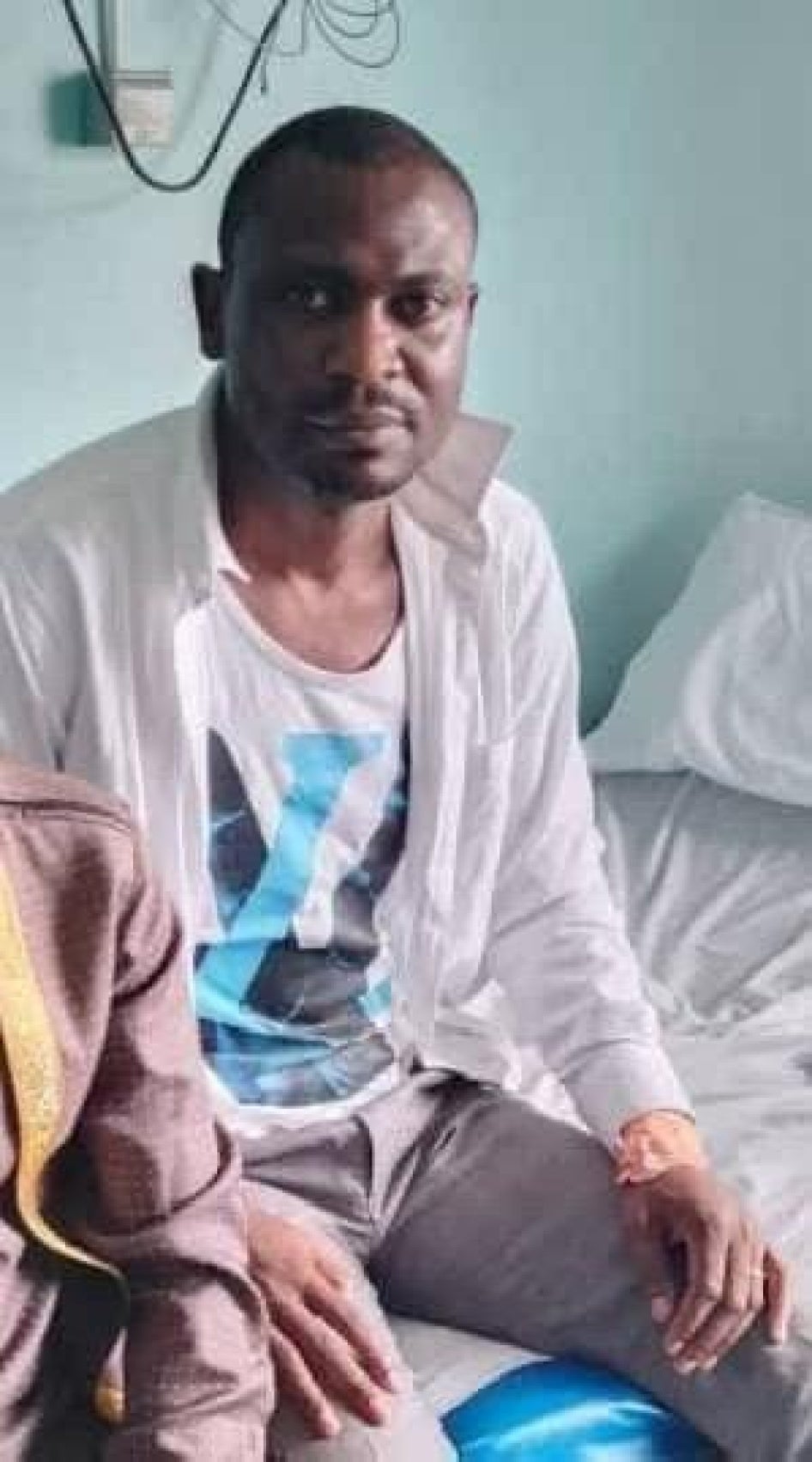 Leading Human Rights Lawyer Richard Tamfu at the hospital following beatings by gendarmes in Douala, Cameroon, November 2024.