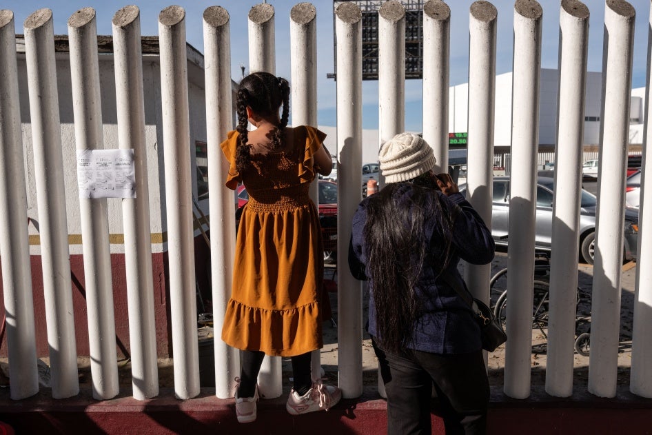 Asylum seekers wait for news on the CBP One appointments at El Chaparral crossing port in Tijuana, Baja California state, Mexico, on January 21, 2025. 