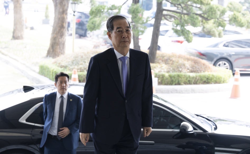 South Korean Prime Minister Han Duck-soo arrives at the Government Complex in Seoul, March 24, 2025.
