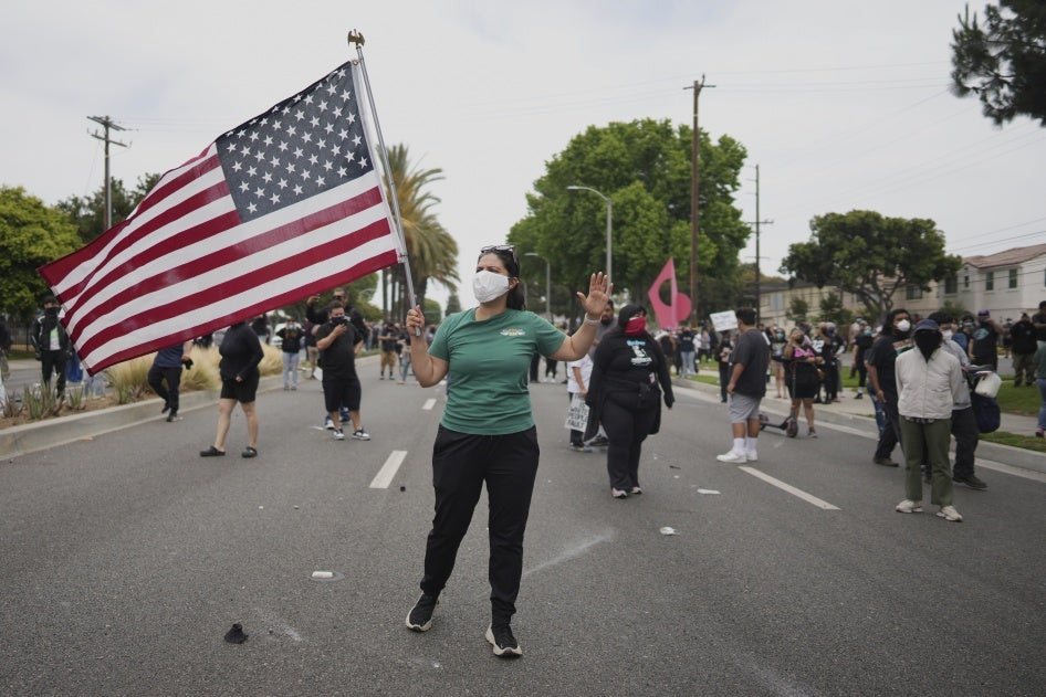 Demonstrators confront Border Patrol personnel during a protest in Paramount, California, on June 7, 2025.