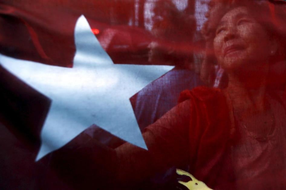 Supporters outside the National League for Democracy headquarters (NLD) in Rangoon on November 9. 