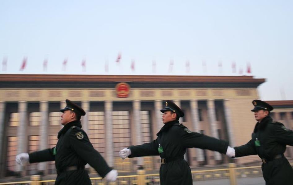 Paramilitary soldiers guard near the Great Hall of the People in Beijing, March 5, 2015.