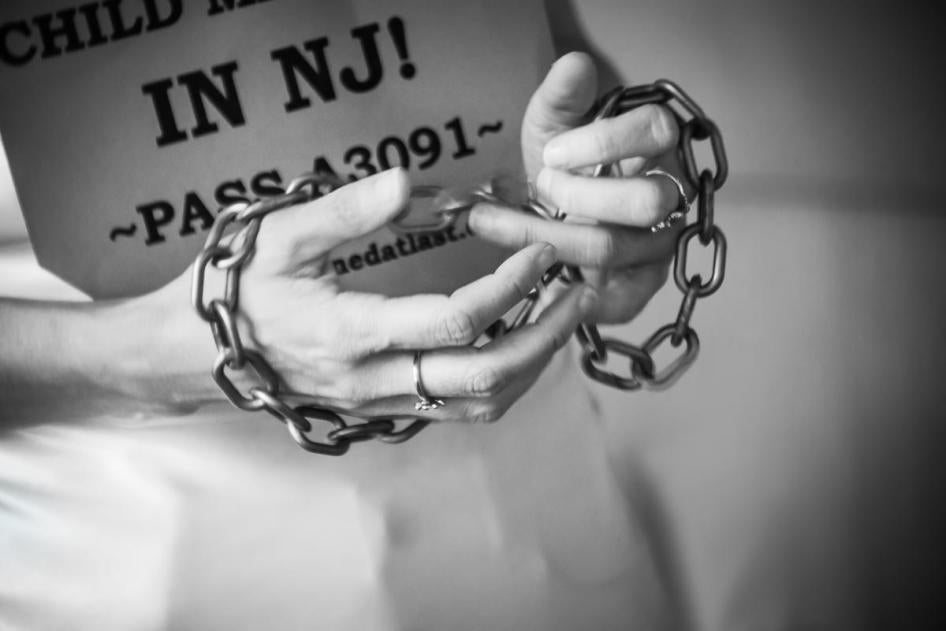 One of a group of activists in wedding dresses, protesting in support of a bill to end child marriage in New Jersey United States, July 2016.