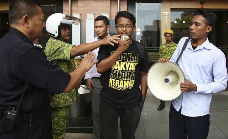 A university student leader calls for the repeal of the sedition act outside the Malaysian Ministry of Home Affairs building in Putrajaya on September 5, 2014.