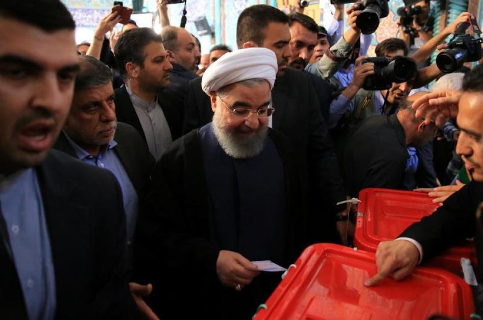 Iranian President Hassan Rouhani casts his vote during the presidential election in Tehran, Iran, May 19, 2017. 