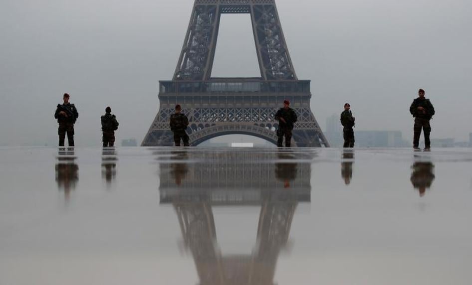 French soldiers patrol near the Eiffel Tower as part of the "Sentinelle" counterterrorism security plan in Paris, France, May 3, 2017. © 2017 Reuters