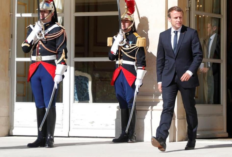 French President Emmanuel Macron waits for a guest outside the Elysee Palace in Paris, France, September 15, 2017. 