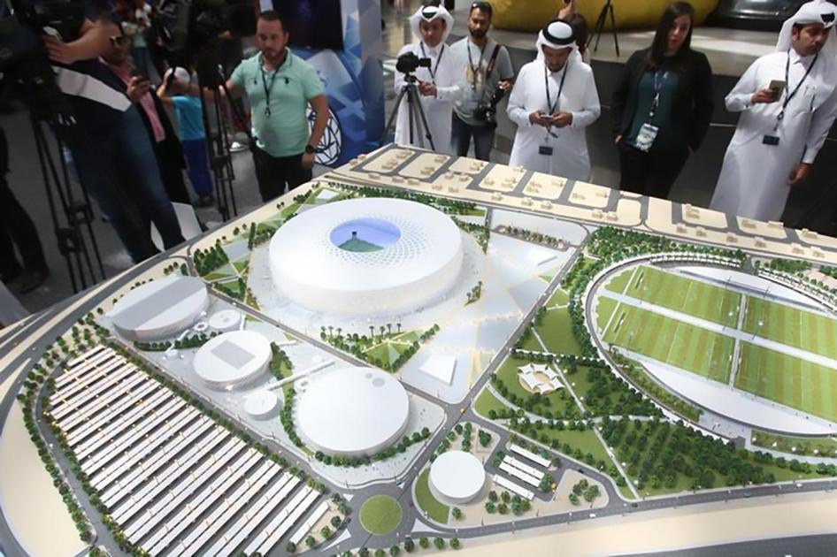 People look at a model of Al Thumama stadium during an unveiling ceremony at Hamad International Airport in Doha, Qatar, August 24, 2017. © 2017 REUTERS/Naseem Zeitoon