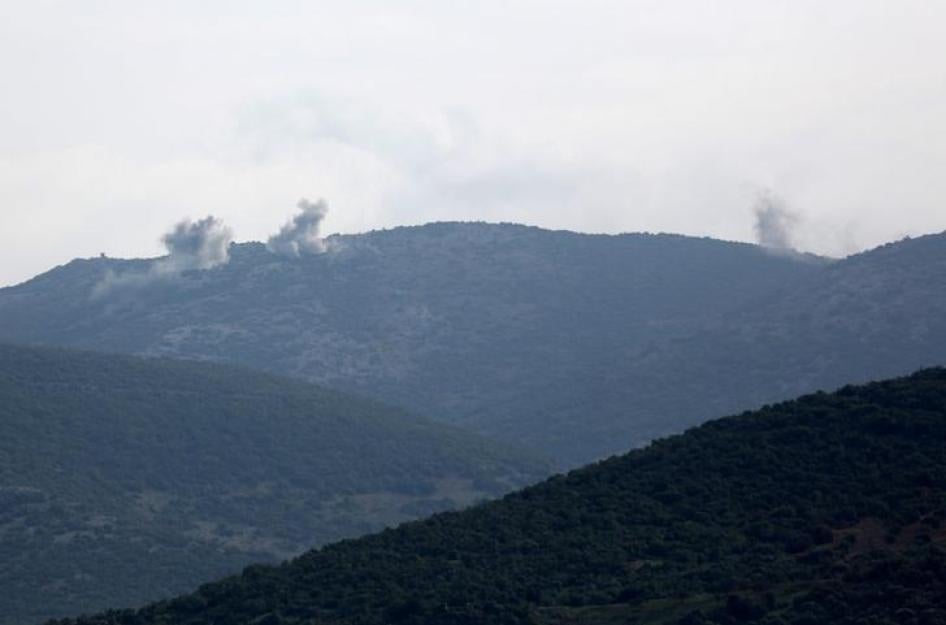 Smoke rises on the mountains as seen from Northern Afrin countryside, Syria on February 15, 2018.