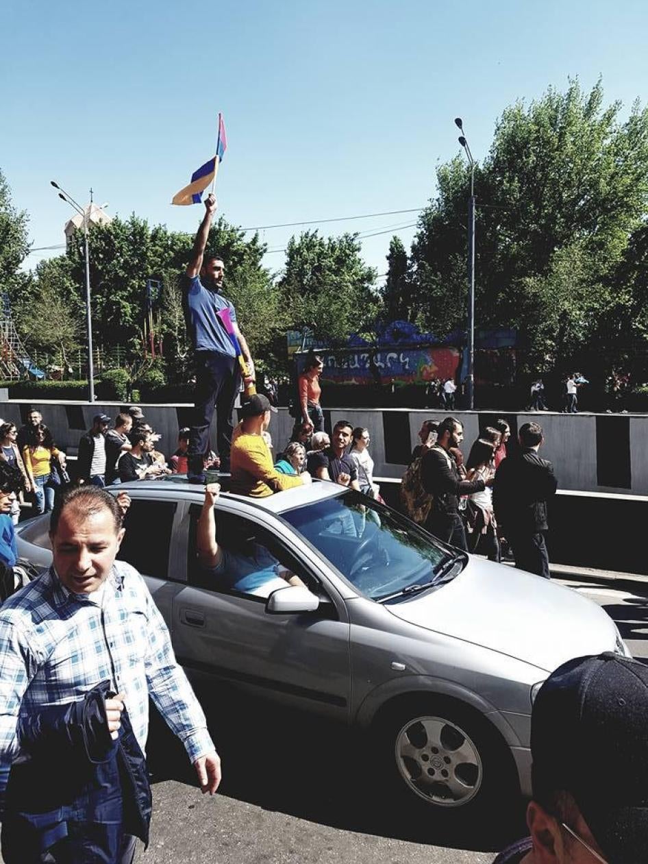 Protesters celebrate the resignation of Prime Minister Serzh Sargsyan following 11 days of protests, Yerevan, Armenia, April 23, 2018.