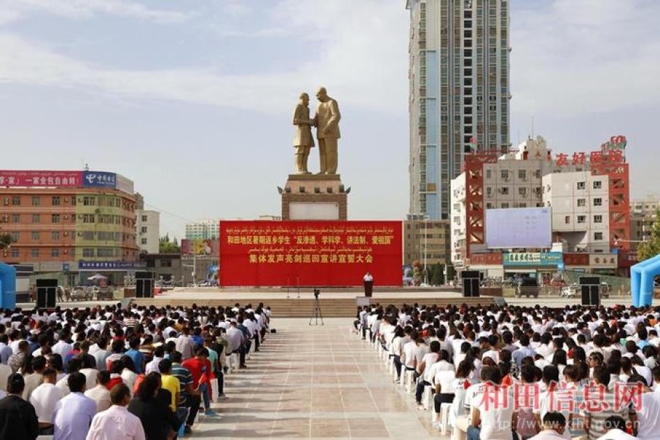 Over 5000 students pledge loyalty to the “Motherland” in a July mass ceremony in Hotan, Xinjiang. 