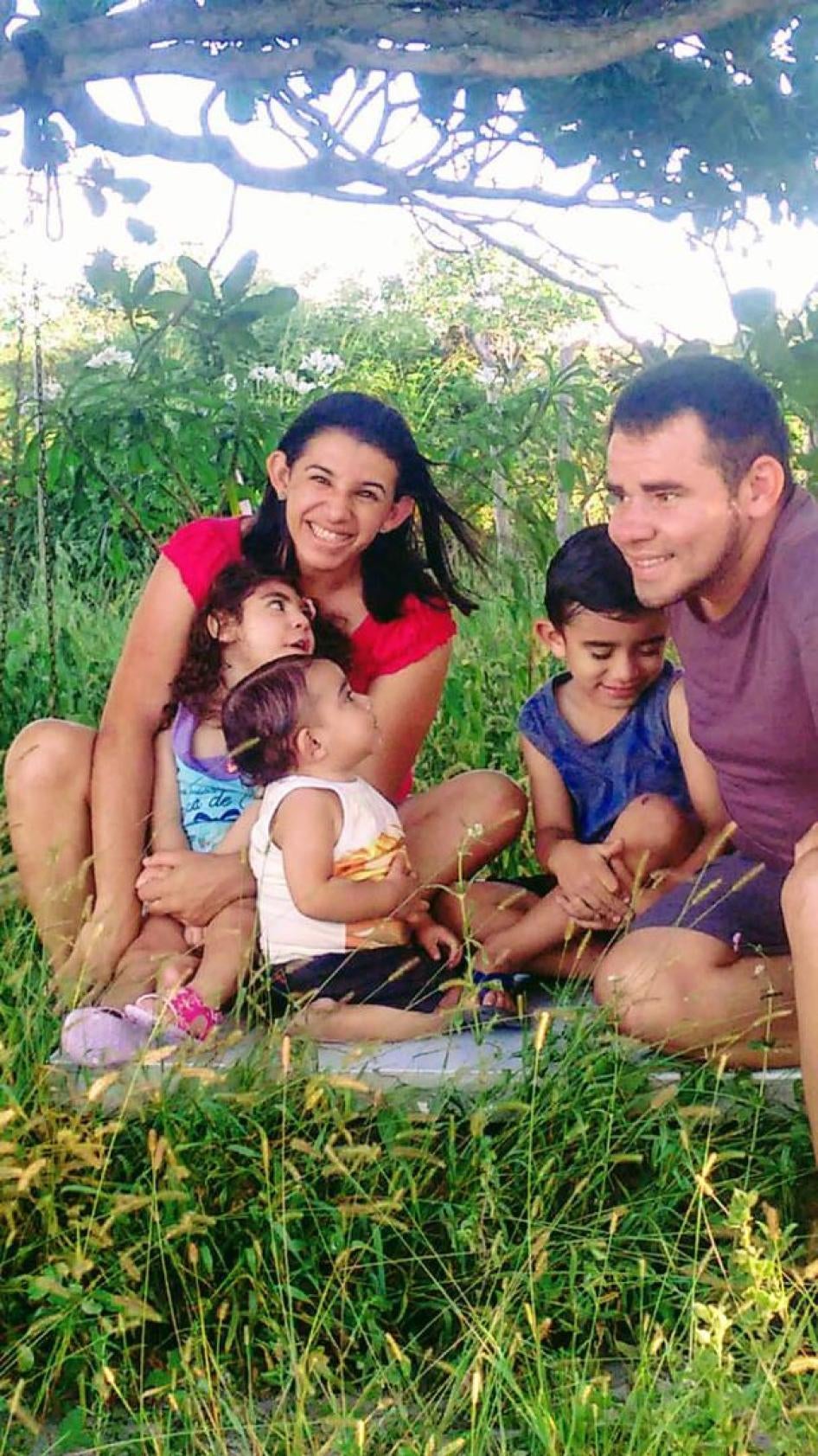 Carol and her husband Joselito with their three children