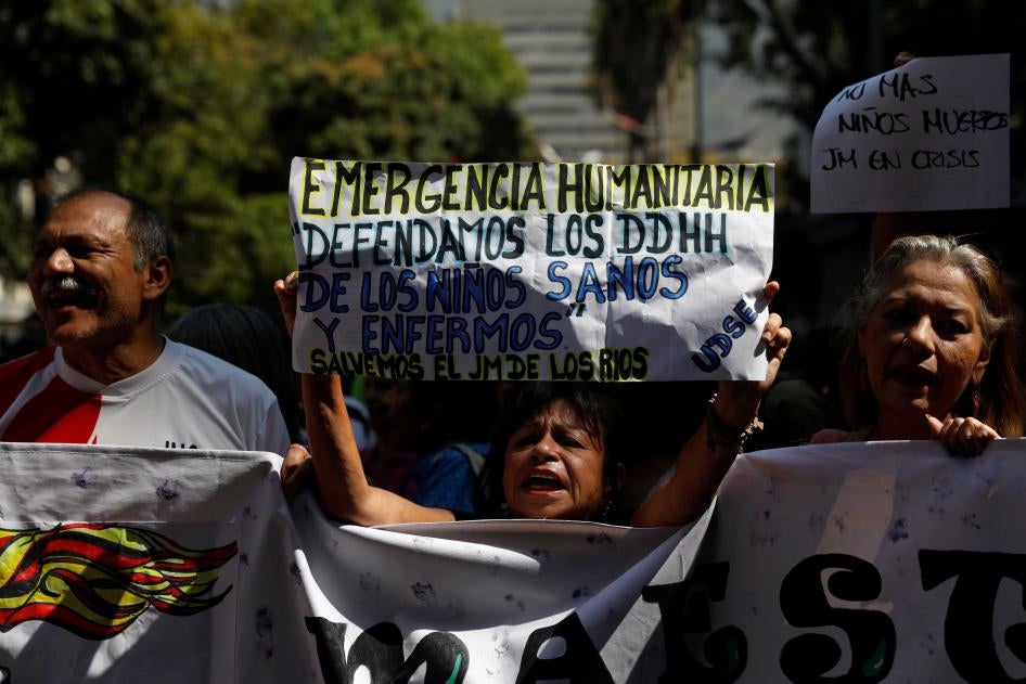 People protest outside the children's hospital JM de los Rios because of lack of medicines, in Caracas, Venezuela March 12, 2020.