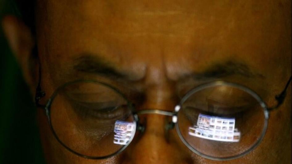a Vietnamese man logs in internet for blogging on his iPad in Hanoi, Vietnam. 