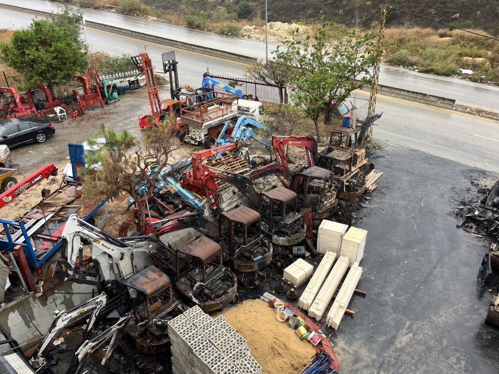 Damaged “Bobcat” Bulldozers from Israeli airstrikes on October 11, 2025 on heavy machinery showrooms in Msayleh, southern Lebanon.