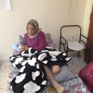 “Selma,” pictured here, and her daughter, were injured in a border minefield. “Selma”’s leg was amputated as a result of the injury.