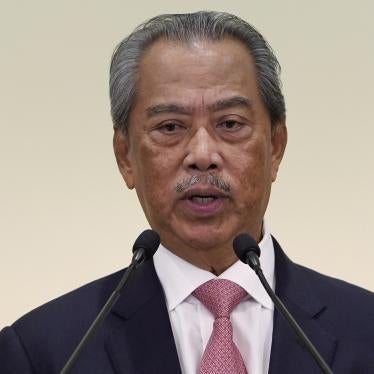 Perdana Menteri Malaysia Muhyiddin Yassin berbicara dalam sebuah konferensi pers setelah pertemuan kabinet pertama di kantor perdana menteri di Putrajaya, Malaysia, 11 Maret 2020. 