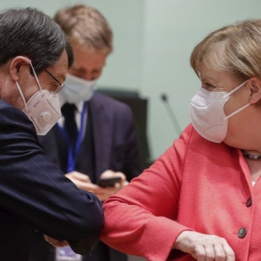German Chancellor Angela Merkel greets Cypriot president Nicos Anastasiades at the EU summit in Brussels, July 21, 2020.