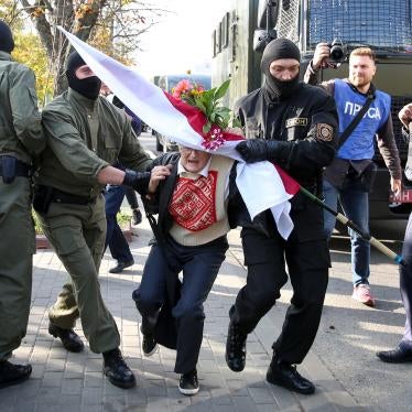 Police officers detain Nina Bahinskaya, 73, during an opposition rally to protest the official presidential election results in Minsk, Belarus, September 19, 2020.