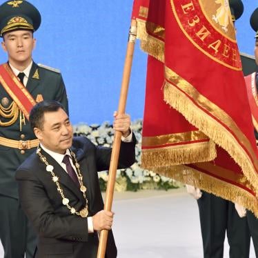 Kyrgyzstan President Sadyr Zhaparov holds presidential standard during his inauguration ceremony in Bishkek, Kyrgyzstan.