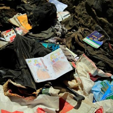 Books, notebooks, and other school supplies are left behind after May 8's deadly bombings near a school in Kabul, Afghanistan, Sunday, May 9, 2021.