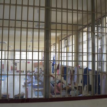 In this photo released by the Department of Corrections, COVID-19 prisoners sit inside a field hospital set up at the Medical Correctional Institution to treat COVID-19 inmates in Bangkok, Thailand on May 8, 2021.