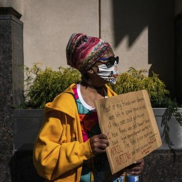 Gina Stanton, of the Homewood neighborhood in Pittsburgh, Pennsylvania, attends a rally held by the Mon Valley  Unemployed Committee and Pittsburgh Restaurant Workers Aid Group at Governor Tom Wolf’s regional office on March 10, 2021, downtown Pittsburgh.