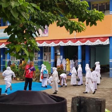 A primary state school in Solok, West Sumatra, where girls and teachers are required to wear the jilbab --Muslim apparel that covers the head, neck, and chest.