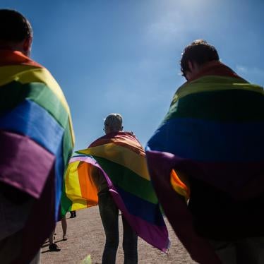 Activists participate in the St Petersburg LGBT Pride march on August 12, 2017.