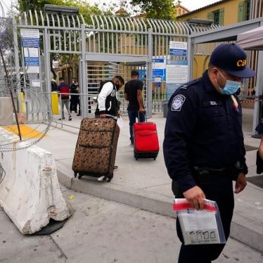 Honduran men cross into the United States to begin the asylum process Monday, July 5, 2021, in Tijuana, Mexico. The administration of President Joe Biden continues to turn away thousands of asylum seekers under the illegal and discriminatory Title 42 summary expulsion policy.