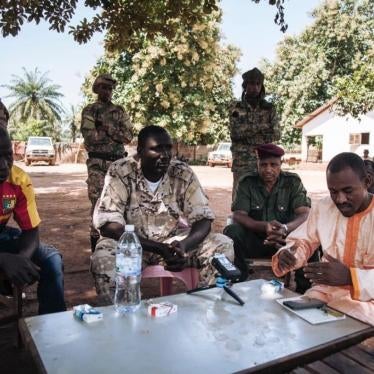 Hassan Bouba Ali (R) with Ali Darassa (C) surrounded by other UPC leaders, during a meeting at their headquarters in Alindao, October 2017. 
