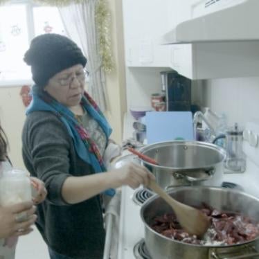 Georgina Wabano and her mother cooking traditional food for school children in Peawanuck, ON, December 18, 2019. : © 2019 Daron Donahue