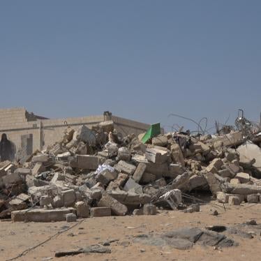 A truck searches for victims under the rubble. The house was destroyed by a Houthi missile in Al-Amoud in al-Jubah district, Marib governorate pictured on October 29, 2021.  