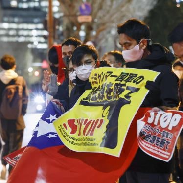 Myanmar people living in Japan protest against military rule in their country on the first anniversary of the coup, outside the Japanese prime minister's office in Tokyo, February 1, 2022.